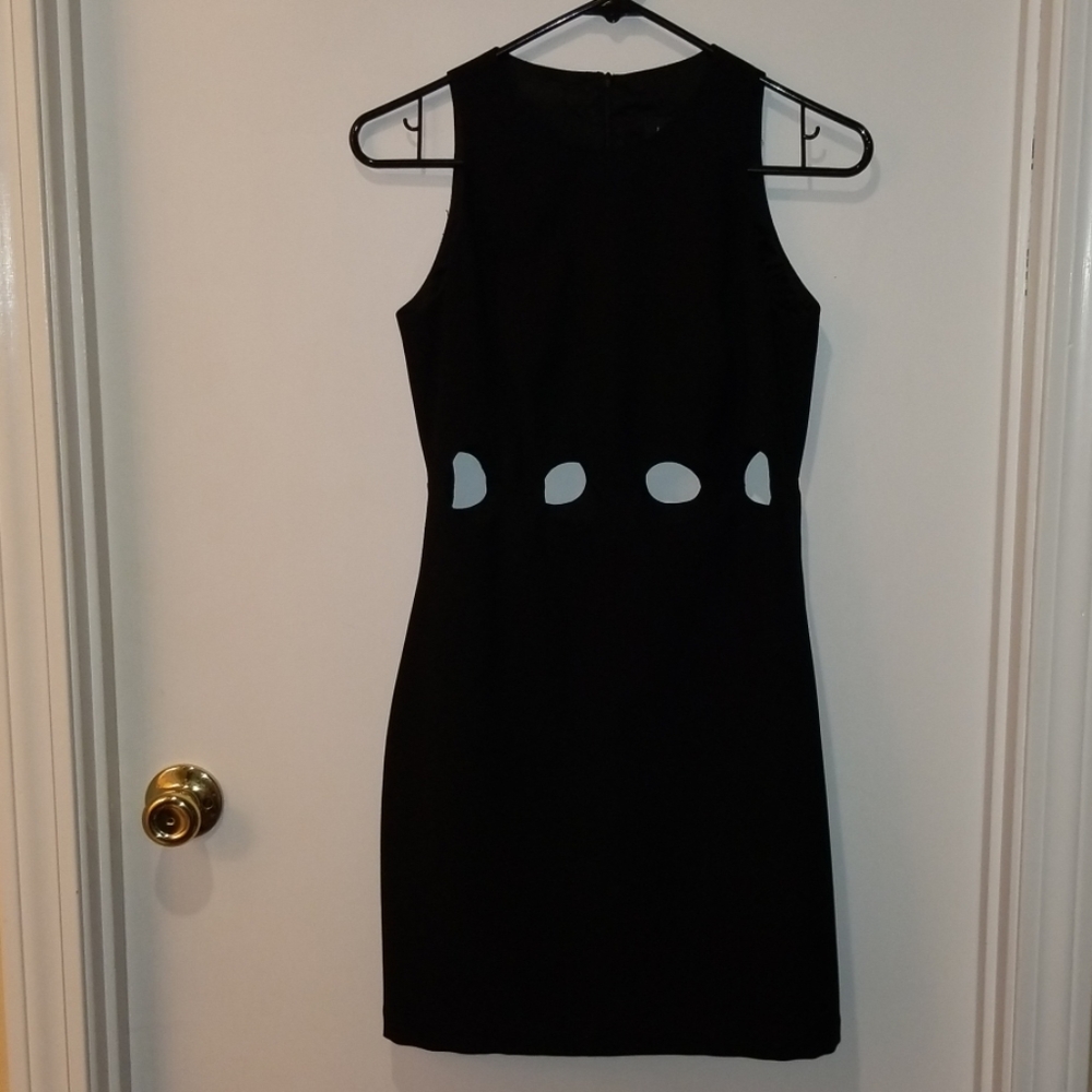 Sassy cocktail dress with cutouts. Never worn. 2